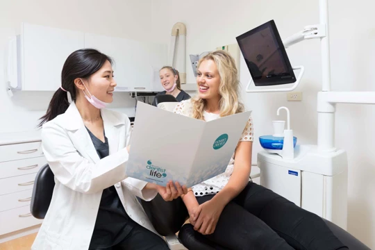 Maven Dental dentist and patient