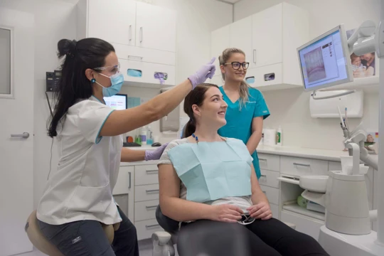 Maven Dentist with patient