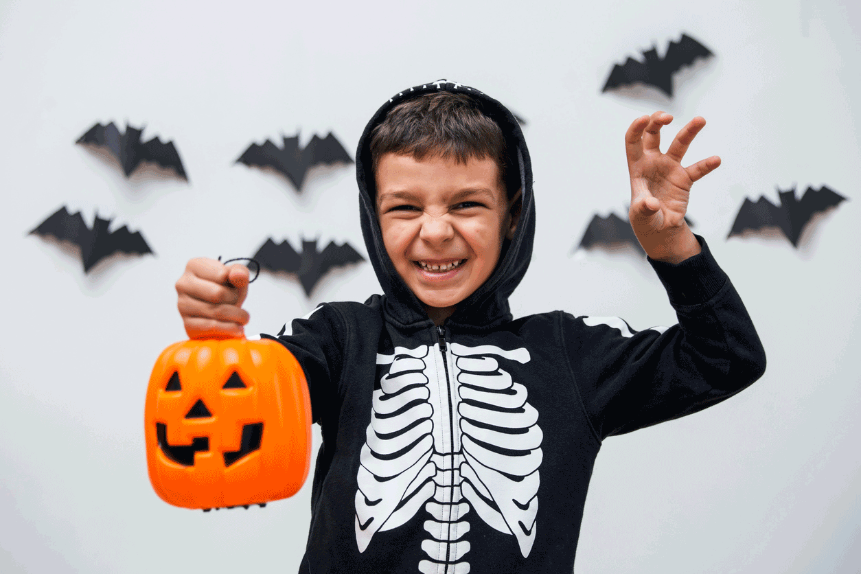 Child in Halloween Costume Smiling 